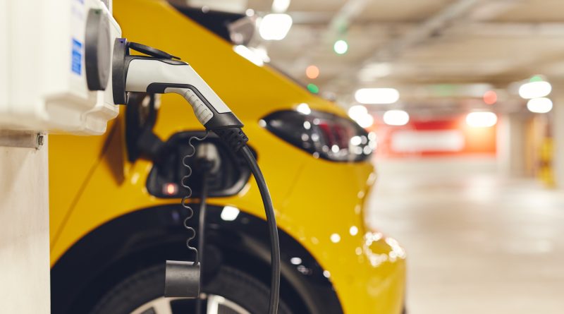 Electric car charging in car park